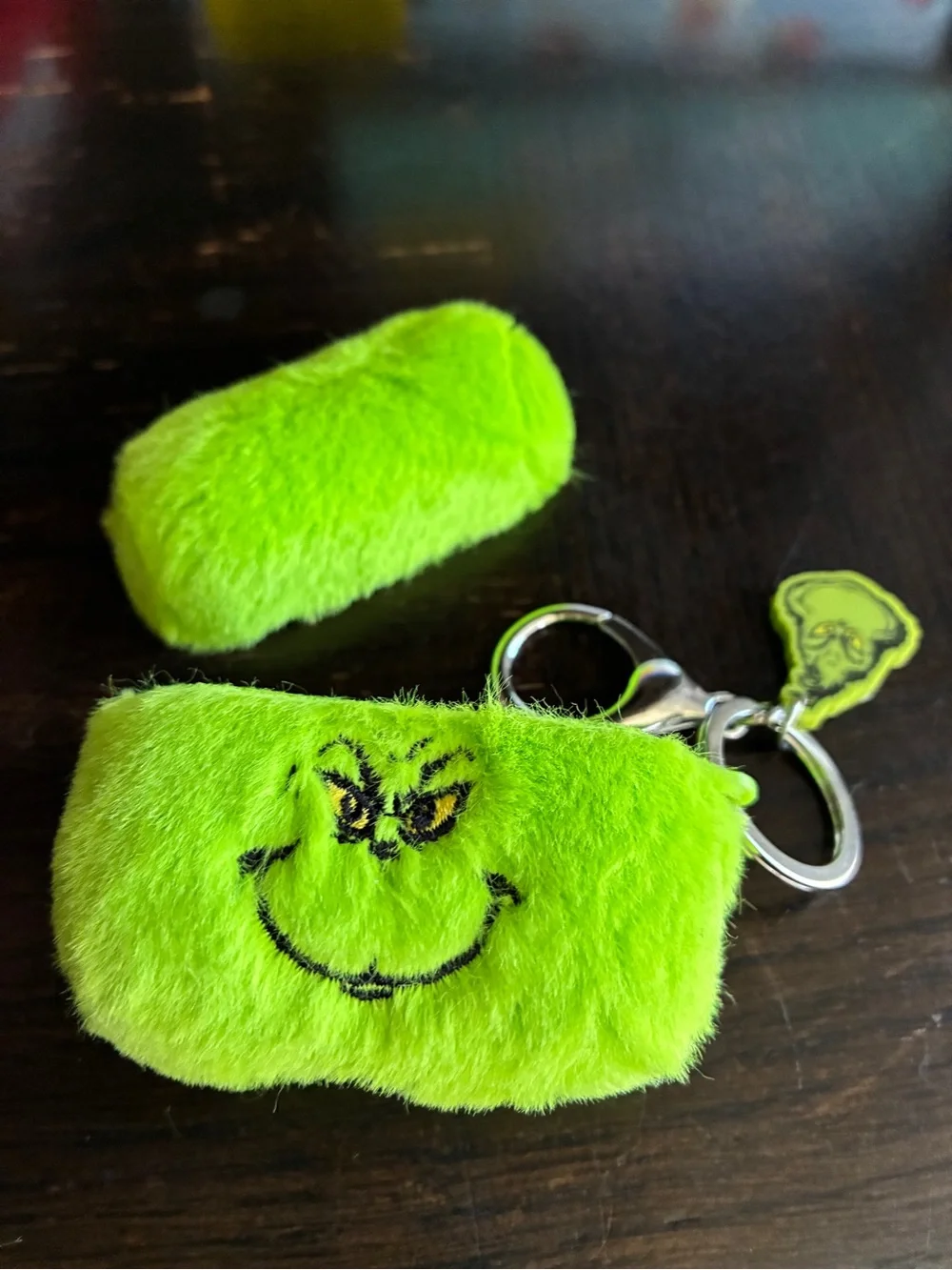 The Grinch Plush AirPods Pro Case in Bright Green with Keyring